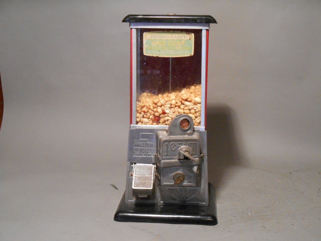 The Master Peanut Machine: Vintage 1920’s Norris Mfg. Co. The Master 15” x 7” x 8” one cent peanut vending machine with key.