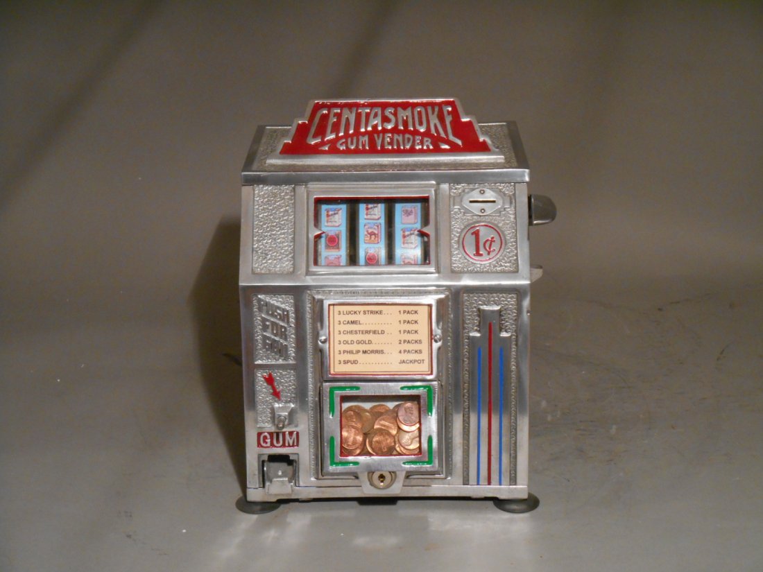 Cigarette Trade Stimulator: Vintage 1936 Daval Products Corporation Centa-Smoke Gum Vender 12 ½” x 9” x 8 ½” one cent three reel cigarette trade stimulator with key.