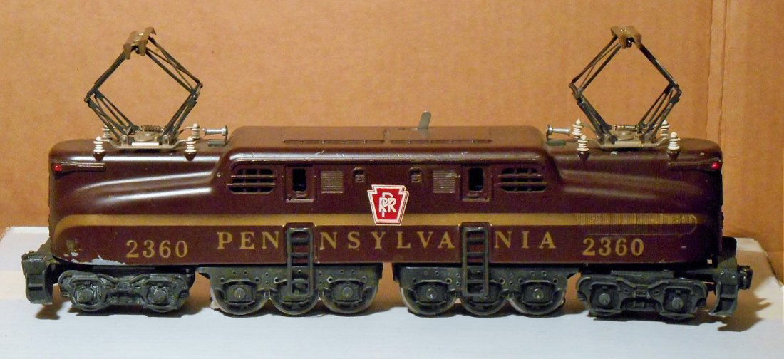 Lionel GG-1 Locomotive: Lionel postwar O gauge #2360 Pennsylvania Tuscan solid stripe GG-1 locomotive.
