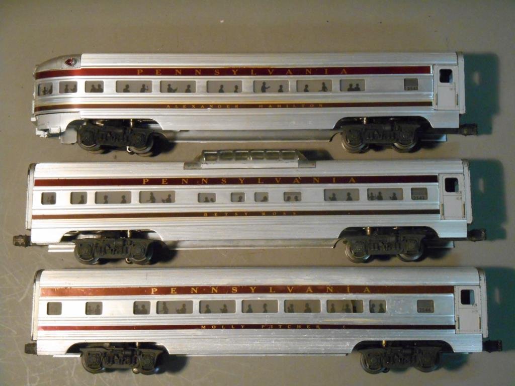 Lionel PRR Passenger Cars: Lot of three Lionel postwar O gauge Pennsylvania Congressional aluminum passenger cars includes: #2541 Alexander Hamilton Observation, #2542 Betsy Ross Vista Dome & #2544 Molly Pitcher Pullman.