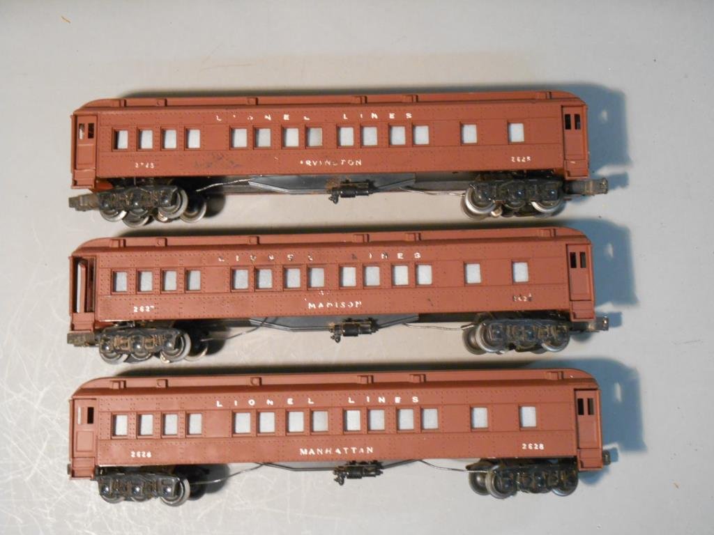 Lionel Passenger Cars: Lot of three Lionel postwar O gauge Madison style passenger cars includes: #2625 Irvington Pullman, #2627 Madison Pullman & #2628 Manhattan Pullman.