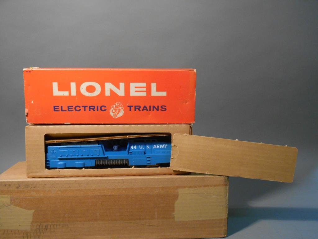 Lionel Army Mobile Launcher: Lionel postwar O gauge #44 U.S. Army Mobile Rocket Launcher car. Comes with its original box & outer sleeve.