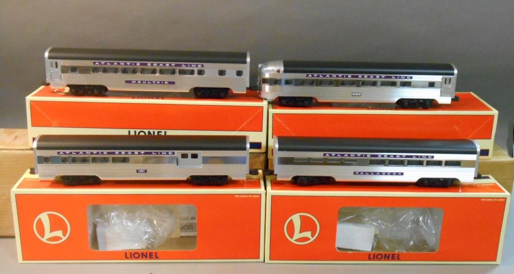 Lionel Passenger Cars: Lot of four Lionel modern era O gauge Atlantic Coast Line aluminum passenger cars includes: #19155 combination car, #19156 Talladega dining car, #19157 Moultrie Pullman car & #19158 observation car. A