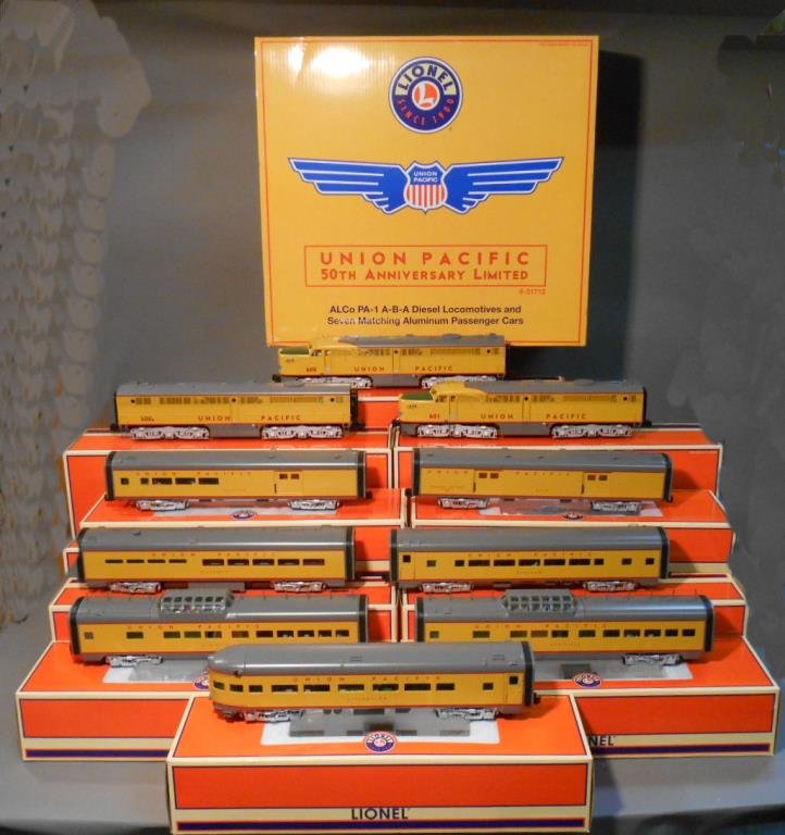 Lionel Union Pacific Set: Lionel modern era O gauge #31712 Union Pacific 50th Anniversary Limited passenger set includes: Alco PA-1 A-B-A diesel locomotives (#14579 “600” powered A-unit,#14580 “600B” non-powered B-unit