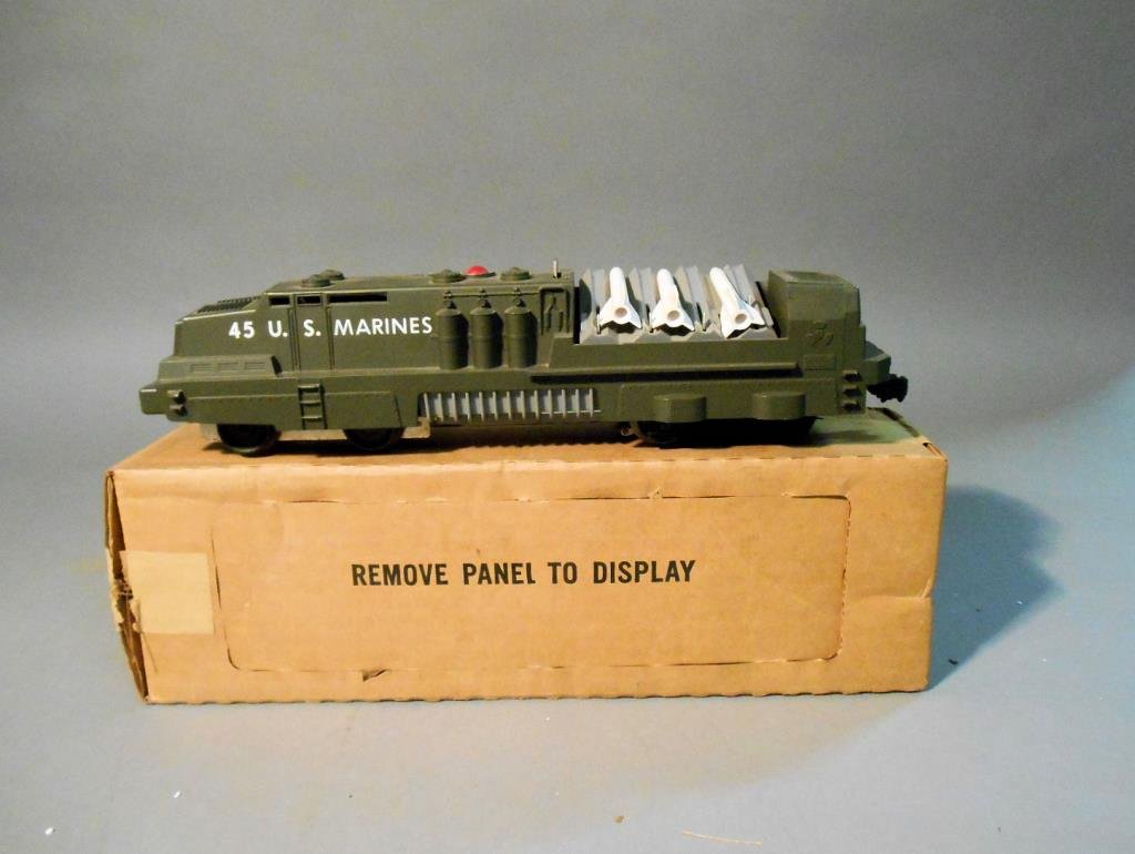 Lionel Missile Launcher: Lionel postwar O gauge #45 U.S. Marines mobile missile launcher. Comes with its original box, instructions & parts(2 extra missiles).
