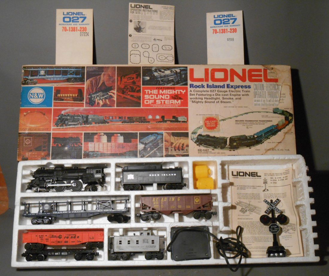 Lionel Rock Island Set: Lionel modern era O gauge #1386 Rock Island Express freight train set includes: #8304 4-4-2 steam locomotive & tender, #9015 Reading hopper, #9023 MKT flatcar, #9070 Rock Island caboose #9125 N&W auto