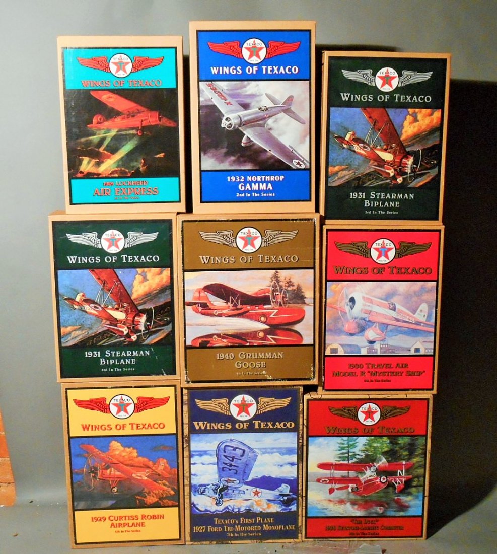 Wings of Texaco Banks: Lot of nine The Ertl Company die cast Wing of Texaco series 1-8 (extra #3) airplane banks. All come with their original boxes
