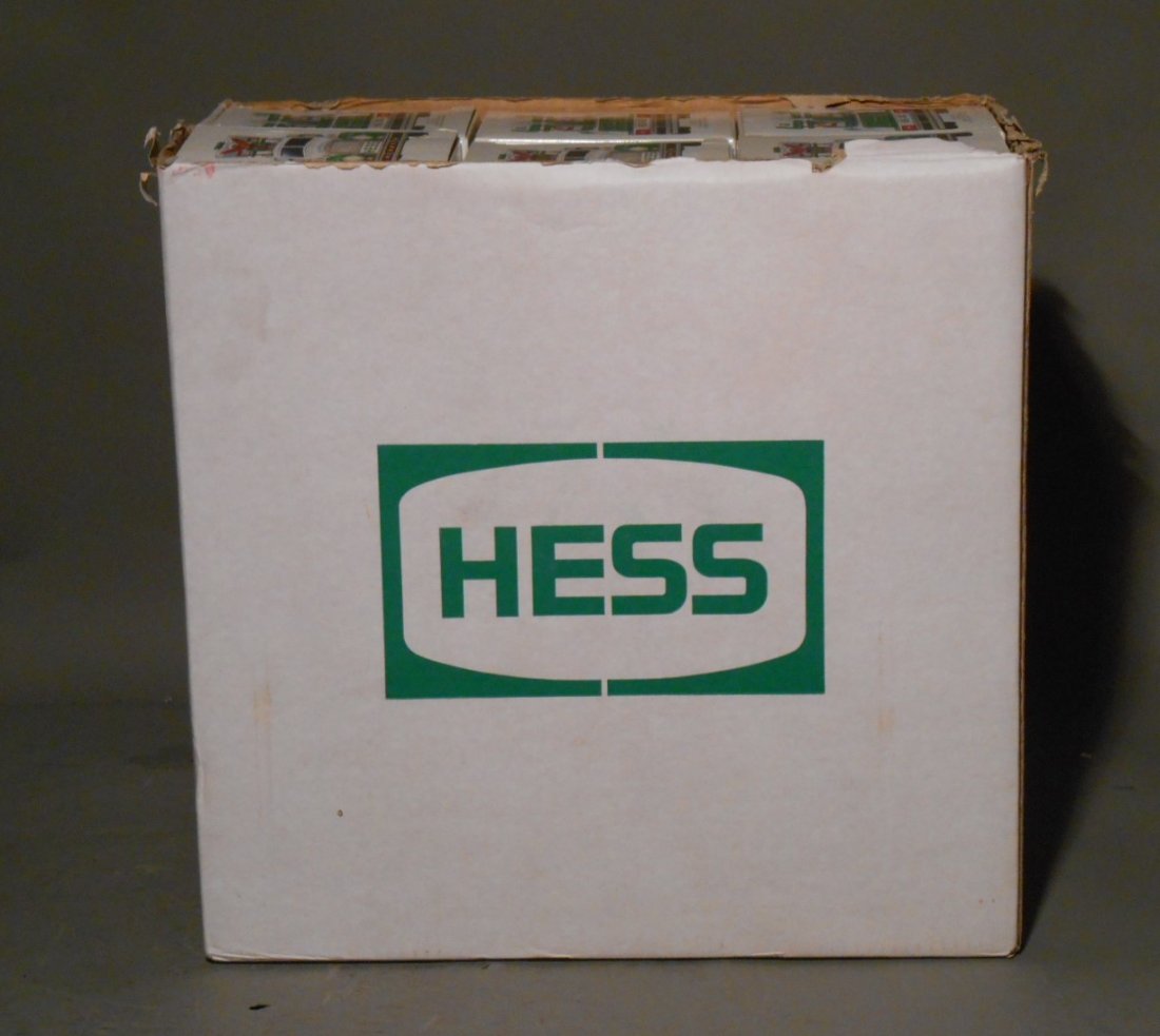 2002 Hess Trucks: Opened case of six 2002 Hess Toy Trucks and Bi-Planes.