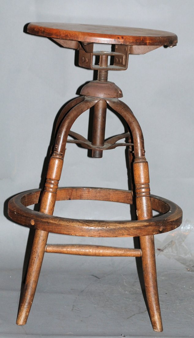 Antique Industrial Stool: Antique birch wood Industrial adjustable stool.