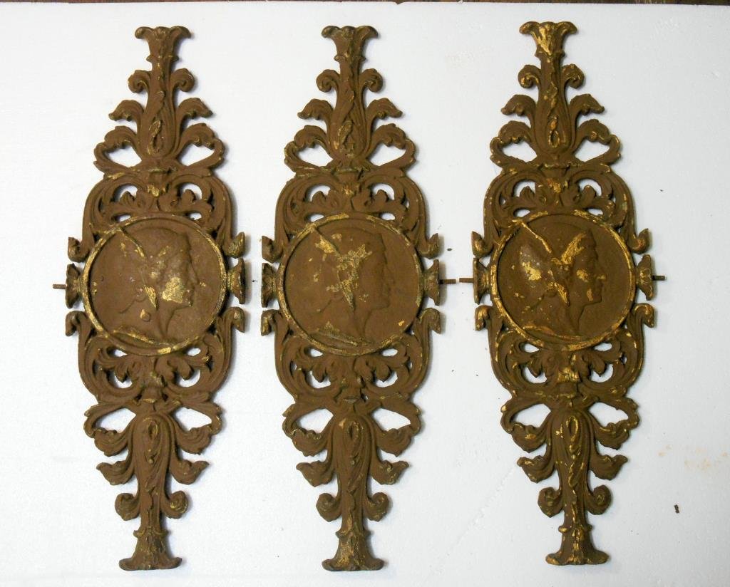 19th c. Architectural Gate Mounts: Three mid to late 19th c. painted cast iron 26” (h) x 7 ½” (l) architectural gate mounts, center medallion with profiles of Mercury on 1 side & Diana on the other side. Condition: All have overal
