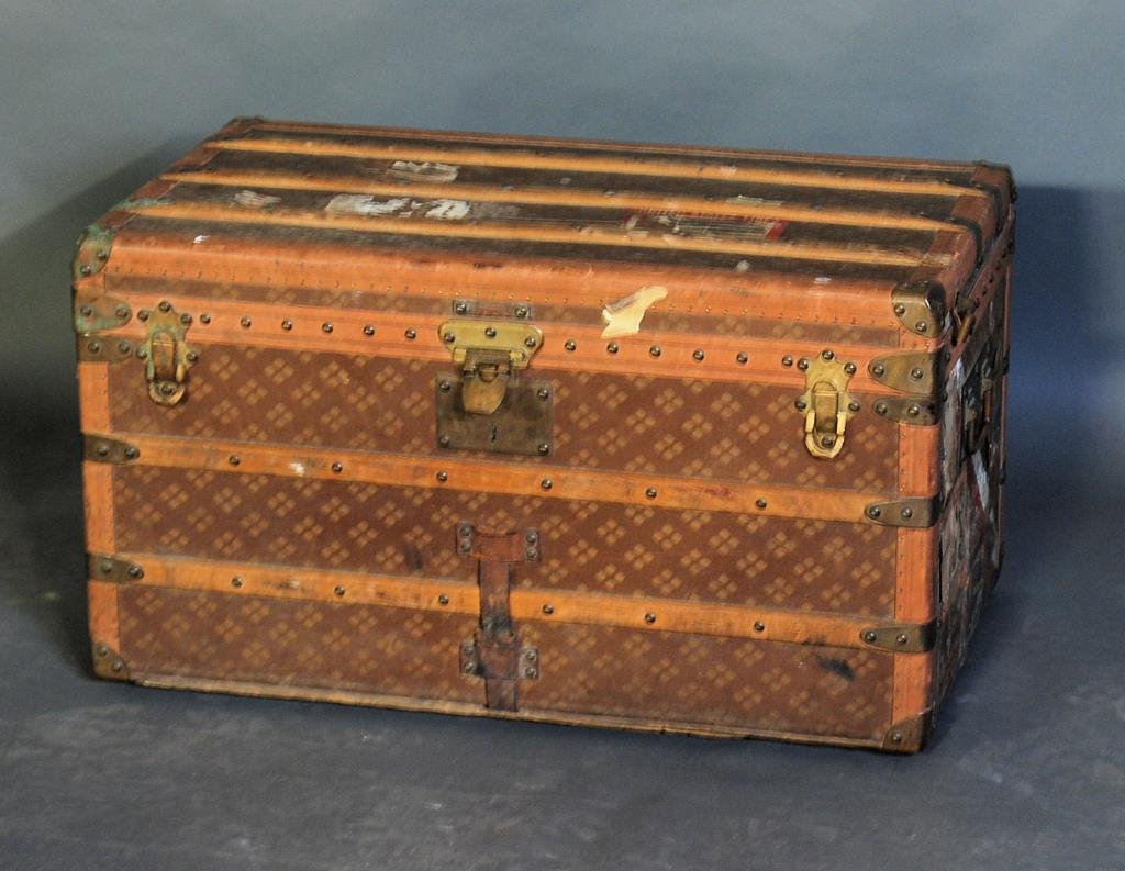 Vintage U.S. Lines Goyard Trunk: Original sold for the United States Lines. Leather and brass bound. Labeled "AUX ETATS UNIS 229 Rue St Honore Paris" #51441. Has original pull out trays. 18"H X 32"W X 18 1/2"D. In good condition with