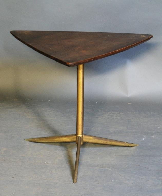 Gio Ponti Style Table: Triangular walnut top with metal base. 21"H X 26"W point to point. Wear consistent with age.