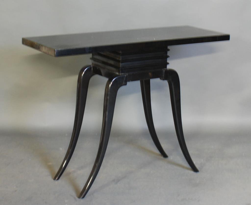 Art Deco Style Console Table: Ebonized wood with flared legs. 34 1/2"H X 46 1/2"W X 16 1/2"D. Old repairs - otherwise in good condition.