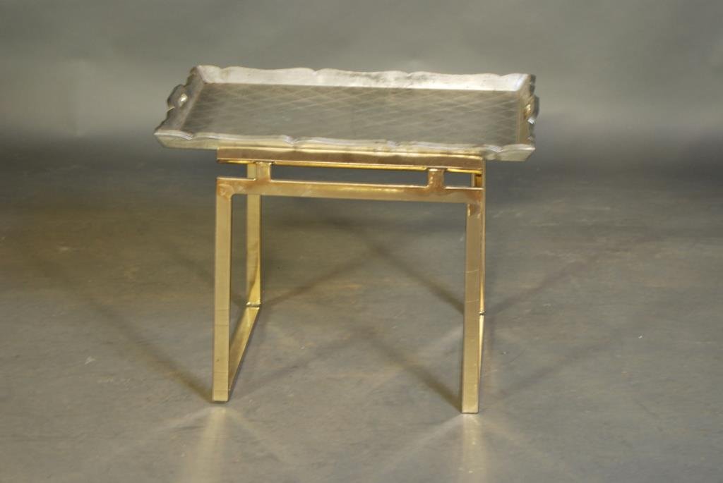 Tommi Parzinger Style Tray Table: Aluminum clad tray top on brass base. 18 1/2"H X 25"W X 18"D. Some oxidation - otherwise in good condition.