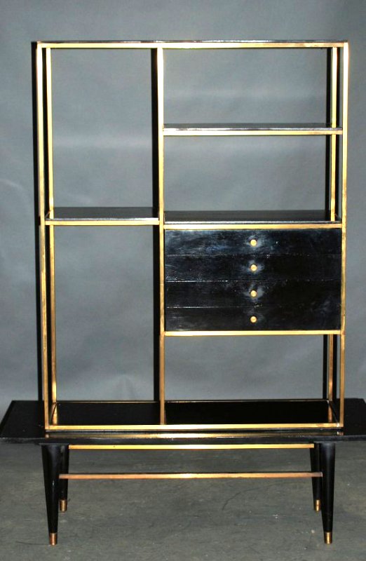 High Style Ebonized & Bronze Etegere By Furnette: Ebonized wood with bronze frame resting on a separate base. Three drawers on one side and false doors on the back. 64 "H X 48"W X 19"D,minor paint wear otherwise in good condition.