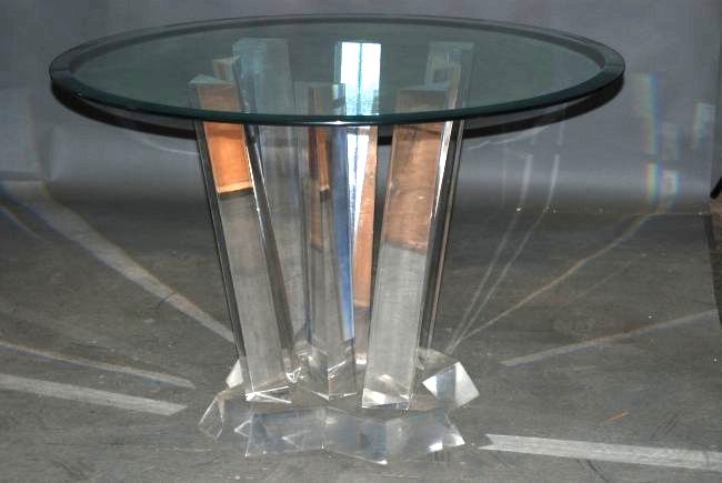 Charles Hollis Jones Style "Miracle"Table: Lucite base with beveled glass top. Minor chip on one column of the base. 29 1/2"H X 46" Diameter.