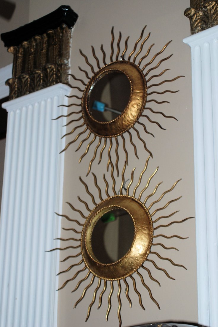Pair of Italian Gilt Metal Sunburst Mirrors: Gilt metal frames with mirror inserts. In good condition. 22"Dia.