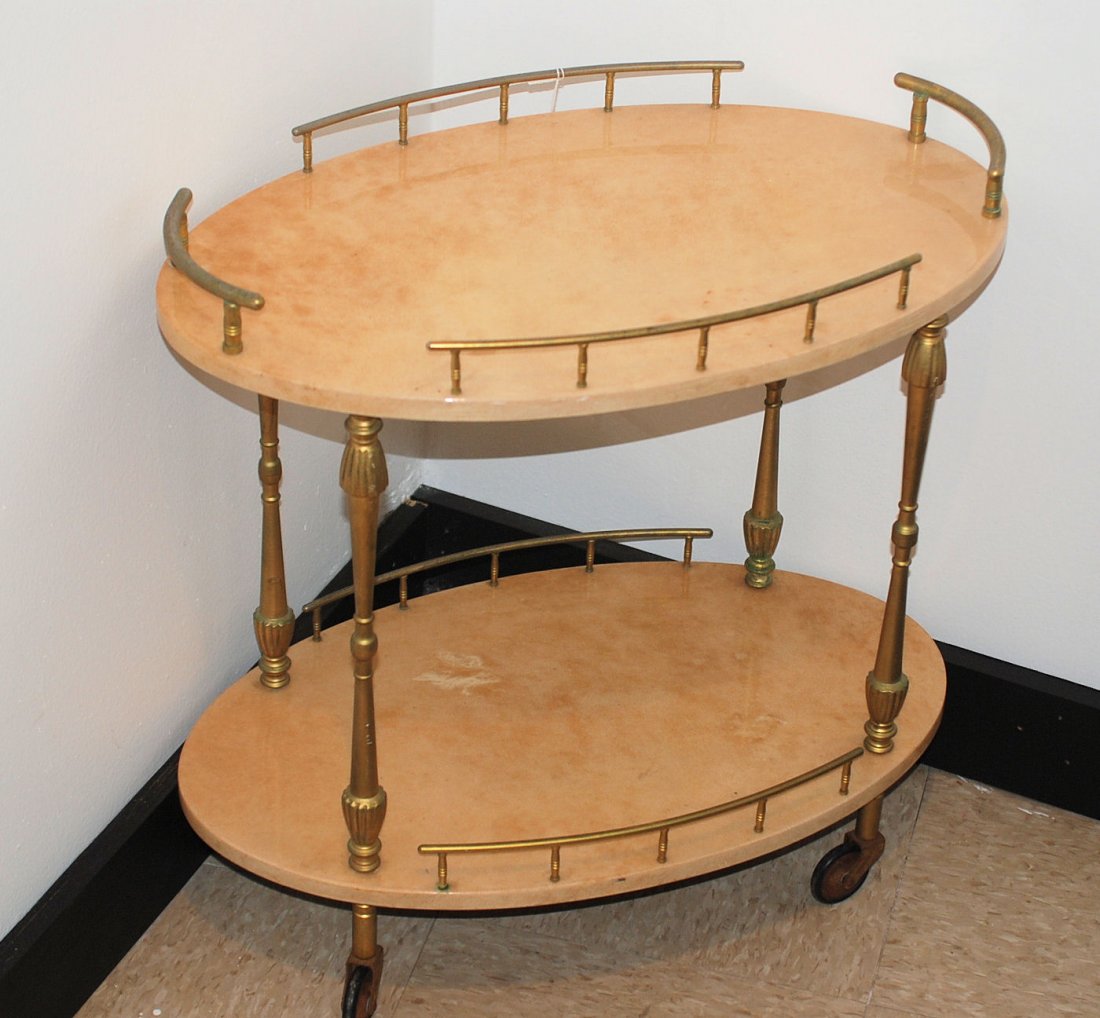 Aldo Tura Liquor Cart: Parchment cover with brass mounts. 21.5"H X 22"W X 13"D Labeled on the underneath.