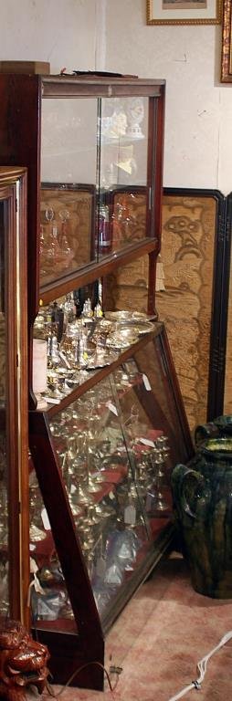 Vintage Store Display Case: Vintage Store Display Case Vintage mahogany colored store display case with mirrored back, glass shelves, and sliding doors by Good Fixtures W.B. McLean Mfg Co. Dimensions: 72"W x 24"D x 88"H Conditio