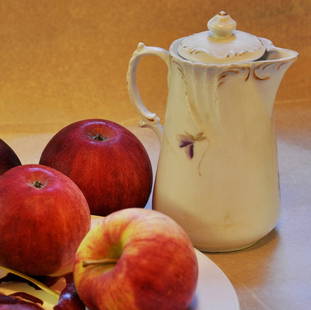 Anne-Marie Dannenberg : Apples and the old jar: This Salmagundi work of art is titled, "Apples and the old jar ". Photography. 9.75 x 9.75 (size) 15.5 x 12.5 (framed). Anne-Marie Dannenberg is a photographer who has shown her work in New York since