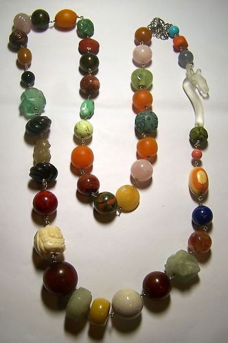 CORAL AMBER ROCK CRYSTAL STERLING SILVER NECKLACE: Measures: 52 inches long, Weights: 455 grams, Gemstone: crystal rock horse clasp, coral, amber, rose quartz, chalcedony, turquoise, agate, lapis lazuli, moonstone, carnelian, onyx set in sterli