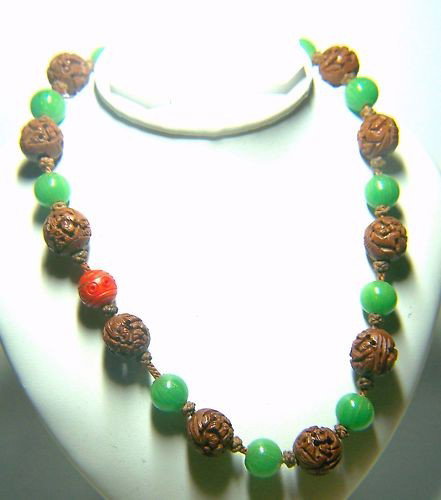 RARE CARVED ASIAN STERLING SILVER CORAL NECKLACE: necklace measures 15 1/2 inches long, Weights 28.8 grams, is made with 12mm hand carved seed wood, 10mm peking glass ,10mm red peking glass, & 10mm coral bead set in sterling silver, is In great c