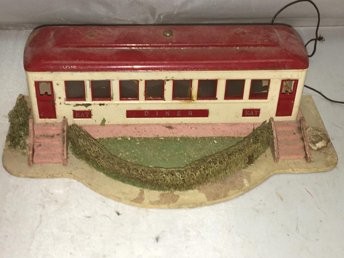 Lionel Prewar O Gauge Diner: Lionel Prewar O gauge diner. Mostly metal, composition landscape. Missing a landscape tree. Otherwise, good condition with signs of use and age.