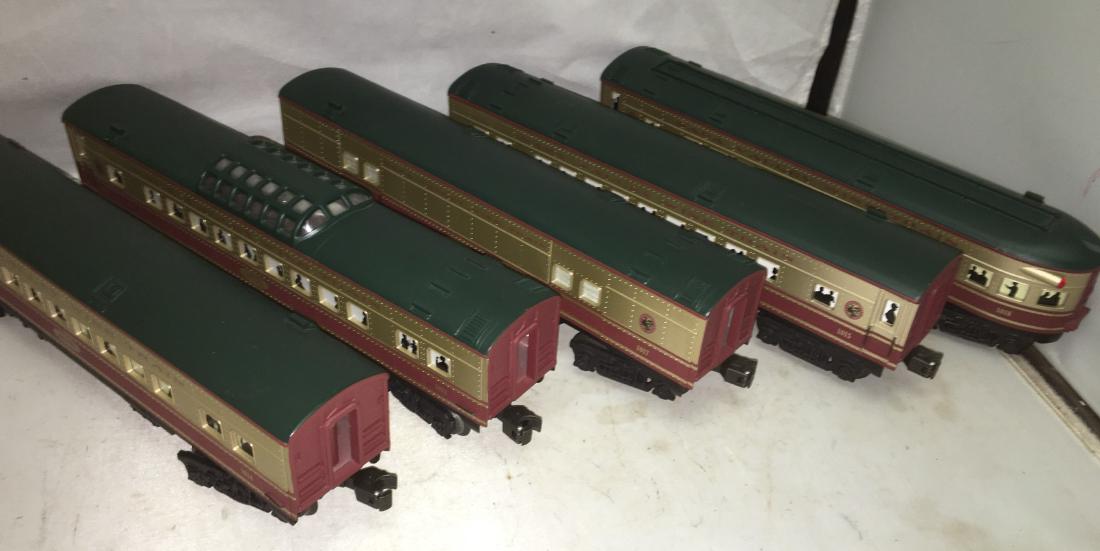 K-Line Napa Valley O Gauge Passenger Cars: Five (5) K-Line Napa Valley Wine O Gauge passenger cars. There is a 1011 Cabeonet Savignon vista dome, a 1014 Zinfadel coach, a 1017 Merlot baggage car, a 1015 LePetit Govenet coach, and a 1018 Chardo
