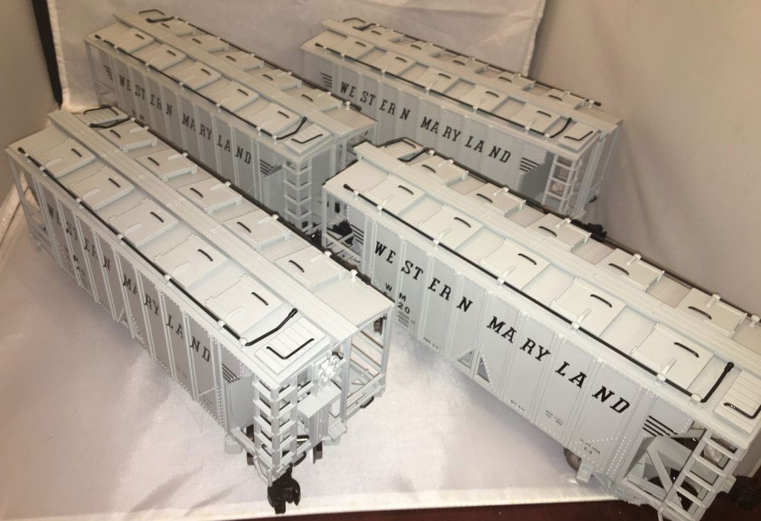 USA Trains WM G Gauge Covered Hopper Cars: Four (4) USA Trains (we think they are USA) Western Maryland G gauge covered hopper cars. Metal wheels.