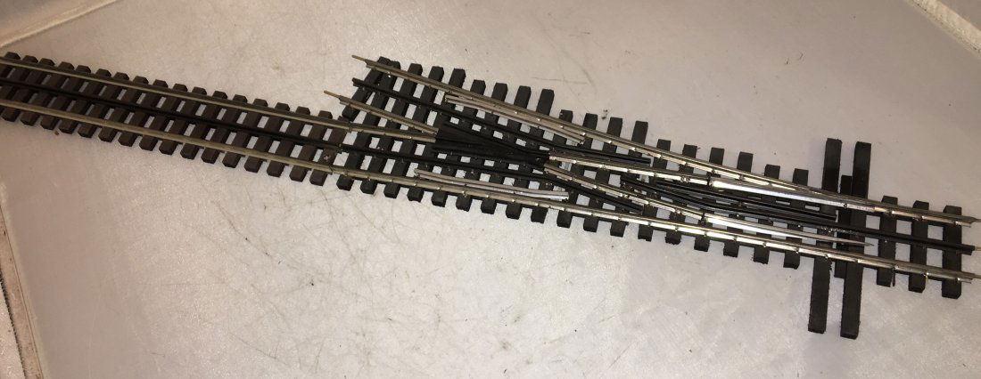 Ross Premium O Gauge Right Hand Switch Plus: Ross Premium O gauge right had switch with Gargraves lead in and exit tracks.