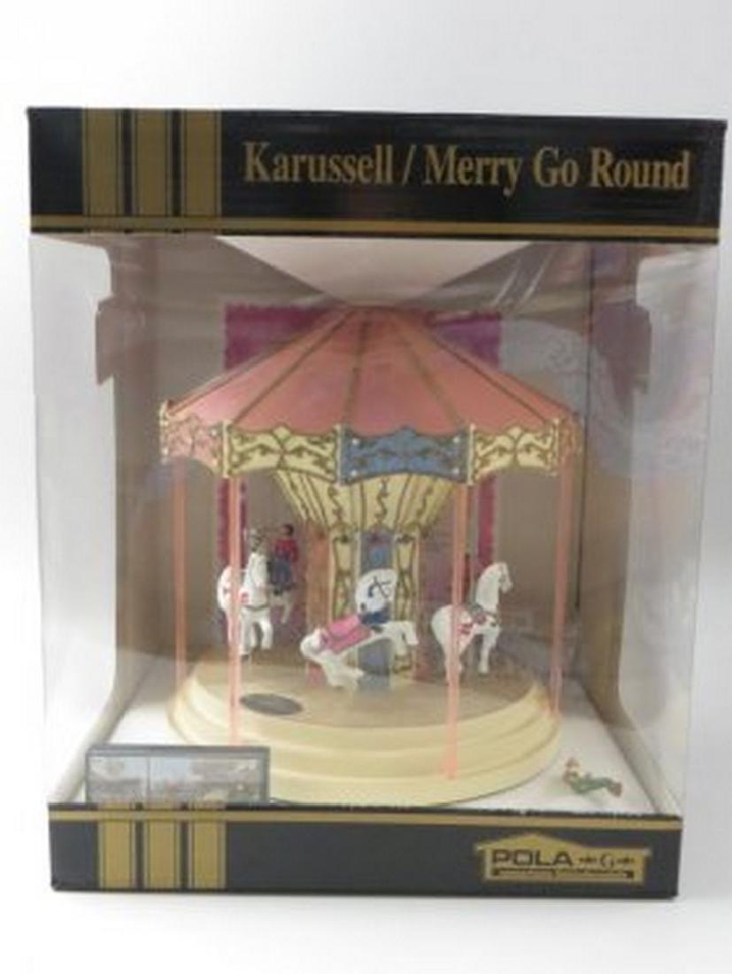 LGB G Scale Karusell Merry-Go-Round: LGB G scale Karusell Merry-Go-Round in the original box. Operating action, sound. Some loose small detail parts.