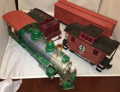 Bachmann G Scale Steam Freight Train: Bachmann G scale steam freight train. There is a radio controlled 7 4-6-0 steam engine, Santa Fe tender (missing a truck), a Santa Fe tender (no trucks), a Santa Fe caboose, a White Pass caboose, and