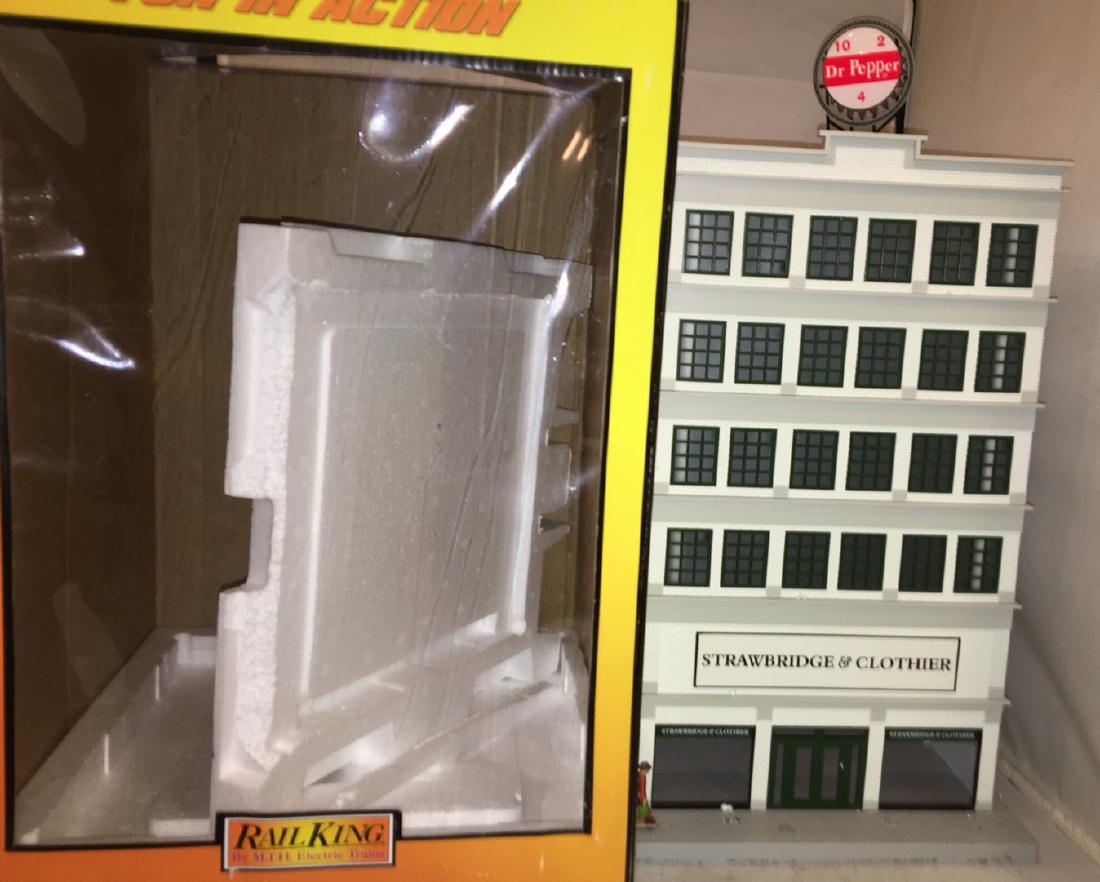 MTH Strawbridge and Clothier O Gauge Building: MTH 30-90383 Strawbridge and Clothier O gauge 6-story building in the original box. Lighted, neon Dr. Pepper rooftop billboard.