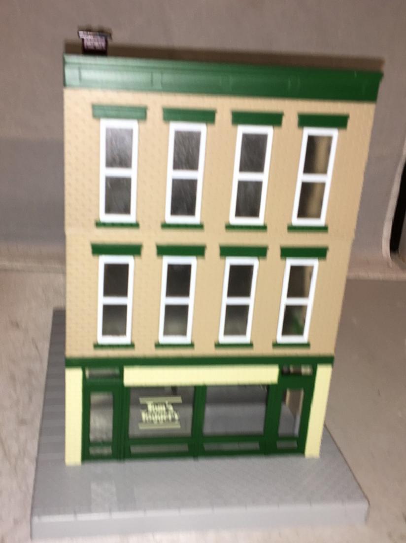 MTH Toms Toggerty O Gauge 3-Story Building: MTH Tom's Toggerty O gauge 3-story building. Lighted.