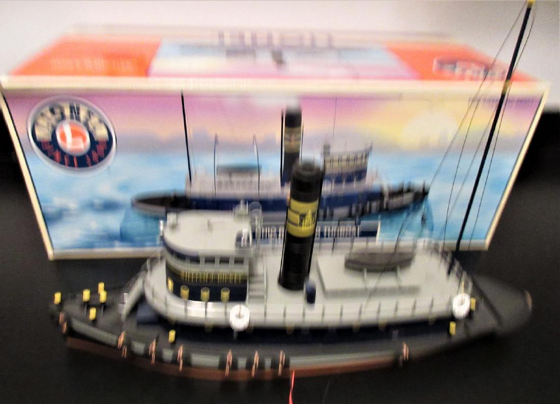 Lionel B&O O Gauge Tugboat: Lionel 14180 Baltimore and Ohio O gauge tugboat in the original box. Smoke, whistle, lighting. No water base.