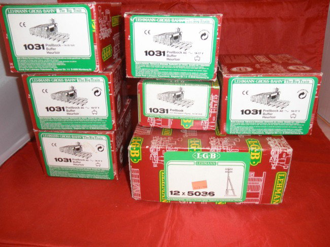 SEVEN LGB G GAUGE ACCESSORIES OB: Seven (7) LGB G scale accessories in the original boxes. 6 lighted bumpers and a box of 12 telephone poles.