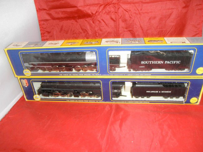 TWO AHM/RIVAROSSI HO GAUGE LARGE STEAM ENGINES OB: Two (2) AHM/Rivarossi HO gauge large articulated steam engines and tenders in the original boxes. Southern Pacific Cab Forward 4-8-8-2 and Delaware and Hudson Challenger 4-6-6-4