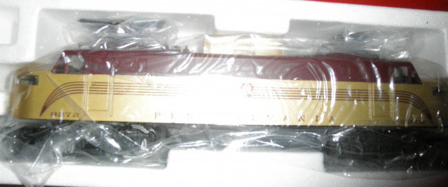 LIONEL 8272 PRR GOLD O GAUGE EP-5 ELECTRIC OB +: Lionel #8272 Pennsylvania O gauge gold EP-5 electric locomotive with display case (not shown) in the original box.