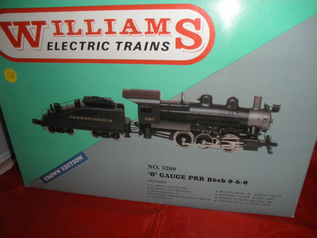 WILLIAMS BRASS PRR O GAUGE 0-6-0: Williams brass Pennsylvania O gauge 0-6-0 steam engine and tender with smoke in the original box.
