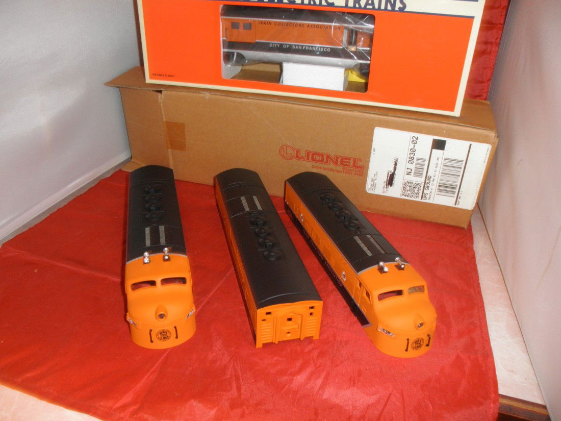 LIONEL TCA O GAUGE TRAINS: Lionel TCA O gauge F-3 ABA replacement shells and 52155 TCA baggage car in the original boxes.