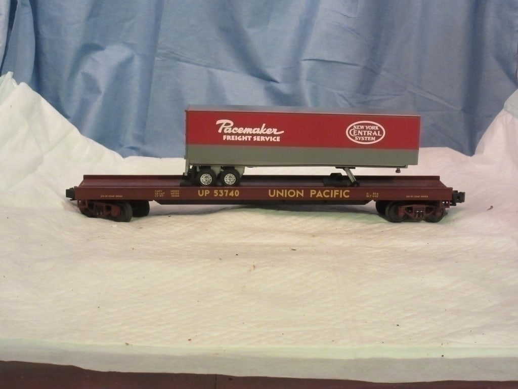 MTH UP O Gauge Trailer Transport: MTH Union Pacific O gauge trailer transport car with a New York Central Pacemaker trailer load.
