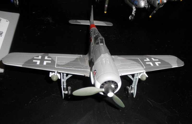 CDC ARMOUR FW190 WORLD WAR II FIGHTER AIRPLANE: CDC Armour FW109 World War II German fighter airplane: metal construction, about 7" long, other very nice features, no box, missing 1 propellor blade, very nice details, very nice color scheme.