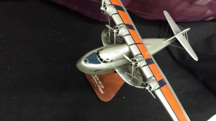 MARTIN M130 1/72 SCALE PAA CHINA CLIPPER: Museum quality Martin M130 1/72 scale PAA China Clipper Airplane: wood construction, display stand, other very nice features, no box, missing 1 propeller blade, very nice details, very nice color sche