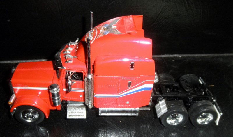 FRANKLIN MINT 1/18 SCALE RED PETERBILT TRACTOR TRUCK: Franklin Mint 1/18 Scale red Peterbilt tractor truck: diecast construction, other very nice features, no box, very nice details, very nice color scheme.