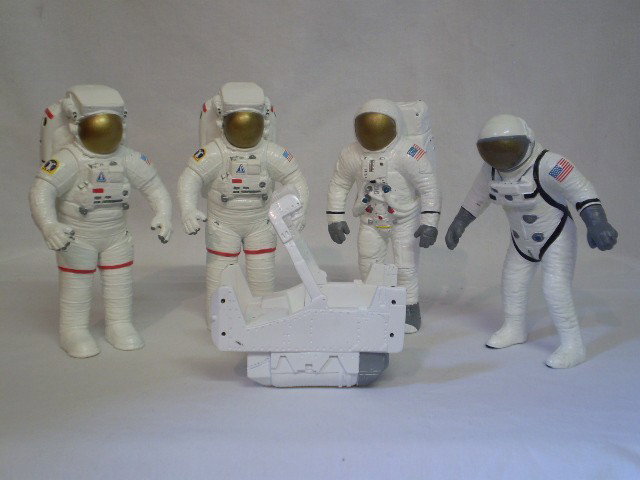 NASA astronauts: 6 NASA astronauts plus a rocket belt.