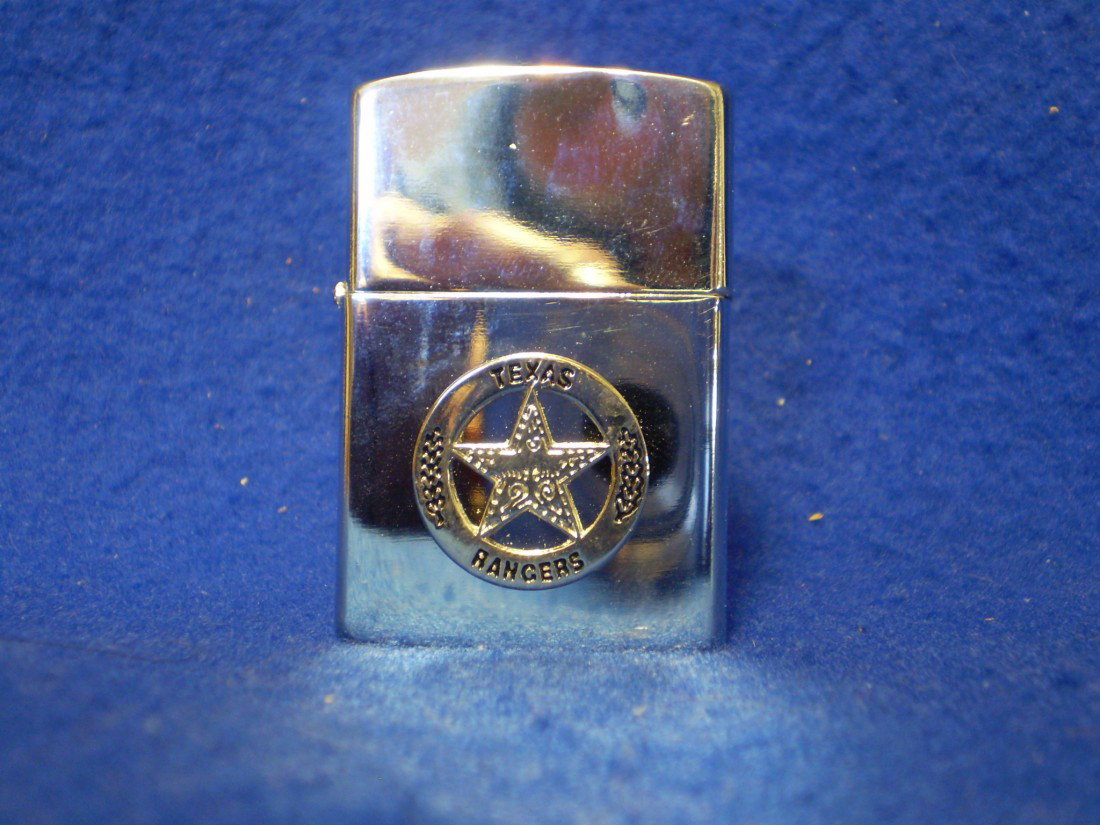 Zippo style lighter with Texas Ranger badge emblem