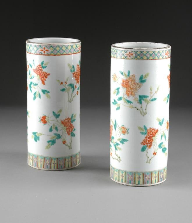 A PAIR OF CHINESE PORCELAIN HAT STANDS,: EARLY 20TH CENTURY, each enameled with flowering branches, with a diapered panel register on rim and base. Note: one hat stand has a few minute superficial "scared" hairline cracks on outer glaze. Hei