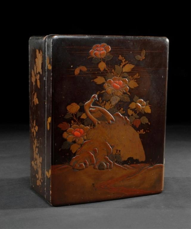 A JAPANESE LACQUER BOX AND COVER,: EDO PERIOD, CIRCA 1830 the cover finely decorated with exotic birds amidst a profusion of foliage, the interior decorated with gold hiramakie on a nashiki ground. Length: 16", width: 12"