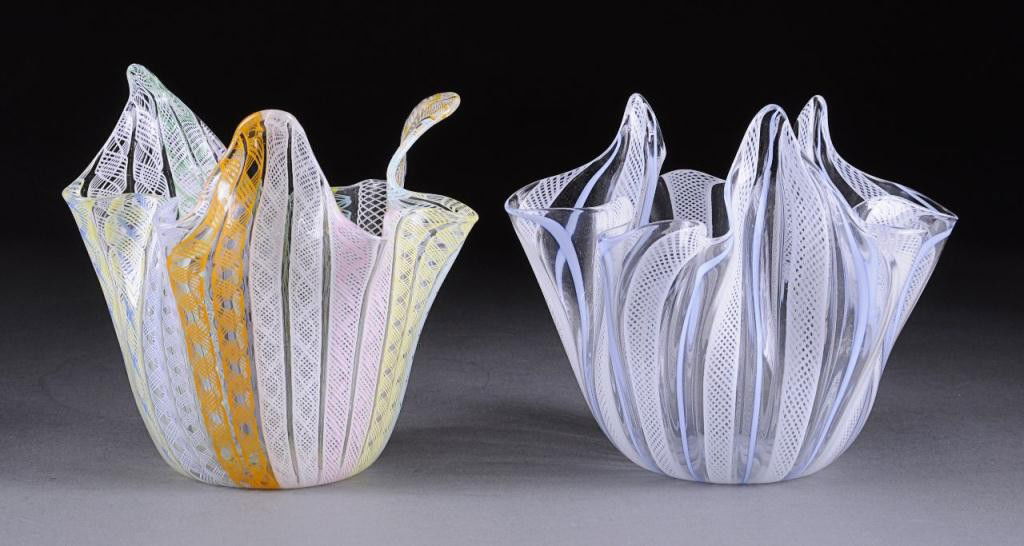 TWO FAZZOLETTO HANDKERCHIEF MURANO LATTICINO GLASS: one having pale blue vertical ribbons alternating vertical latticino bands, height: 5 1/4; together with another with paired vertical bands of latticcio in candy colors of pink, green, yellow, blue, o