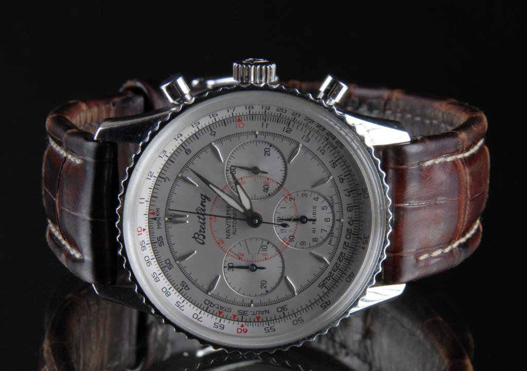 A STAINLESS BREITLING NAVITIMER MONTBRILLIANT: A30030.2, 1688. An automatic Swiss chronograph in stainless steel with leather strap. Watch keeps time and has full functions. Measures 38 millimeters in diameter with a case thickness including the c